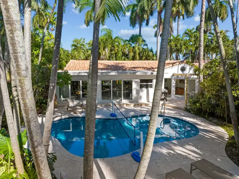 Private pool in the tropical backyard of The Wellness Retreat