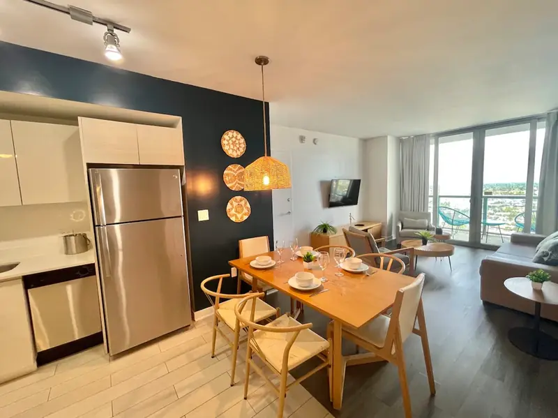 Open kitchen and dining area in the Beachwalk apartment