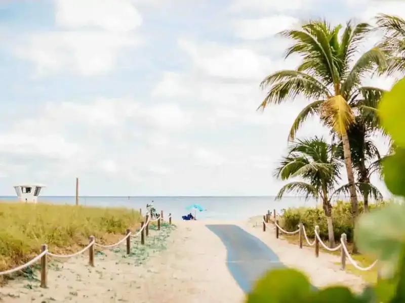 Sandy path through the dunes to the beach in Pompano Beach